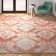 Coyst Damask Orange/White Area Rug