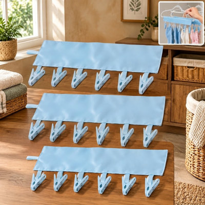 Emportez ce cintre portable pliable lors de croisières ou d'autres voyages pour sécher les vêtements de bain et les chaussettes; Ses épingles et pinces offrent des points de suspension pour les petits articles de lessive.