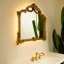 Miroir, miroir pu de style baroque avec un cadre doré orné