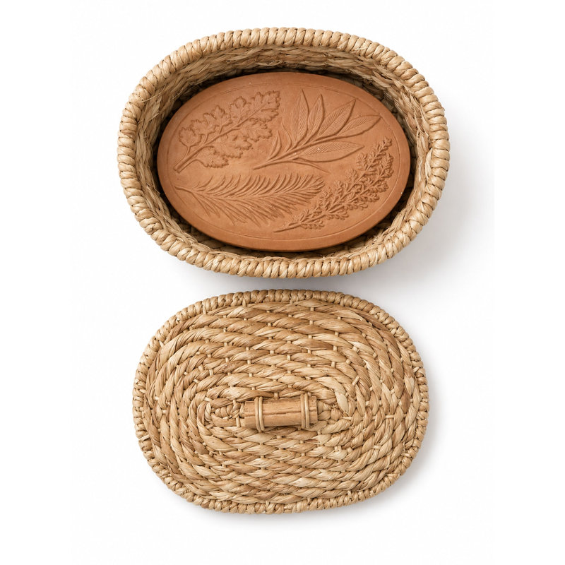 Panier chauffe-pain ovale en jonc de mer tressé à la main Éangee, avec pierre chauffante en terre cuite, persil, sauge, romarin et thym, couleur naturelle, avec couvercle.
