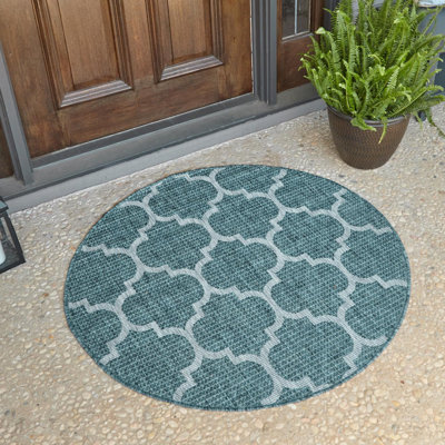 Tapis intérieur / extérieur à motif géométrique bleu sarcelle Annetrude