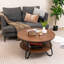 Table basse ronde à 2 niveaux Ebern Designs avec finition grain de bois et structure en métal robuste