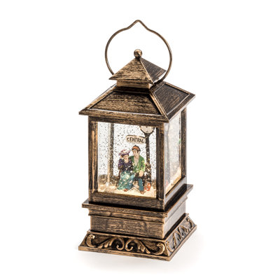 Snow Lantern with Seated Couple on a Bench