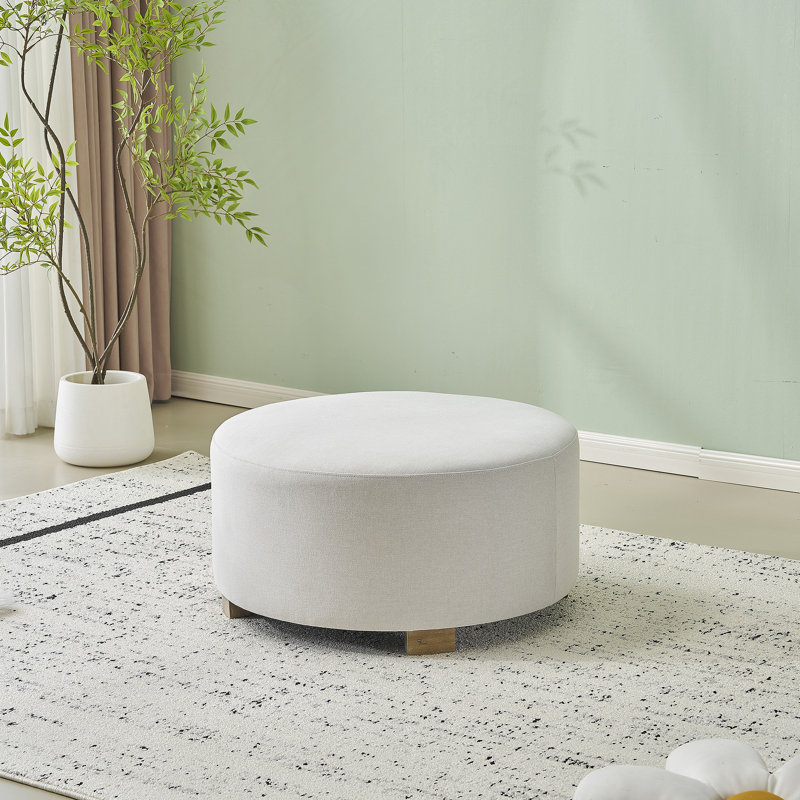 Repose-pieds rond polyvalent avec pieds en bois, idéal pour de multiples espaces de vie et un usage quotidien, design minimaliste moderne