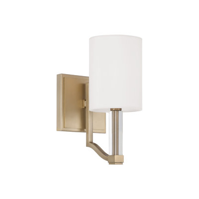 Applique murale 1 lumière l 5 po x H 10,25 po en laiton mat avec accents en acrylique transparent et abat-jour cylindriques en tissu blanc