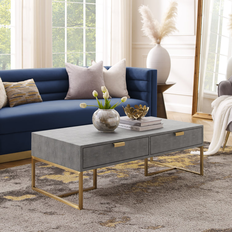 https://assets.wfcdn.com/im/70257295/resize-h755-w755%5Ecompr-r85/2578/257857925/Yadira+Faux+Shagreen+Coffee+Table.jpg