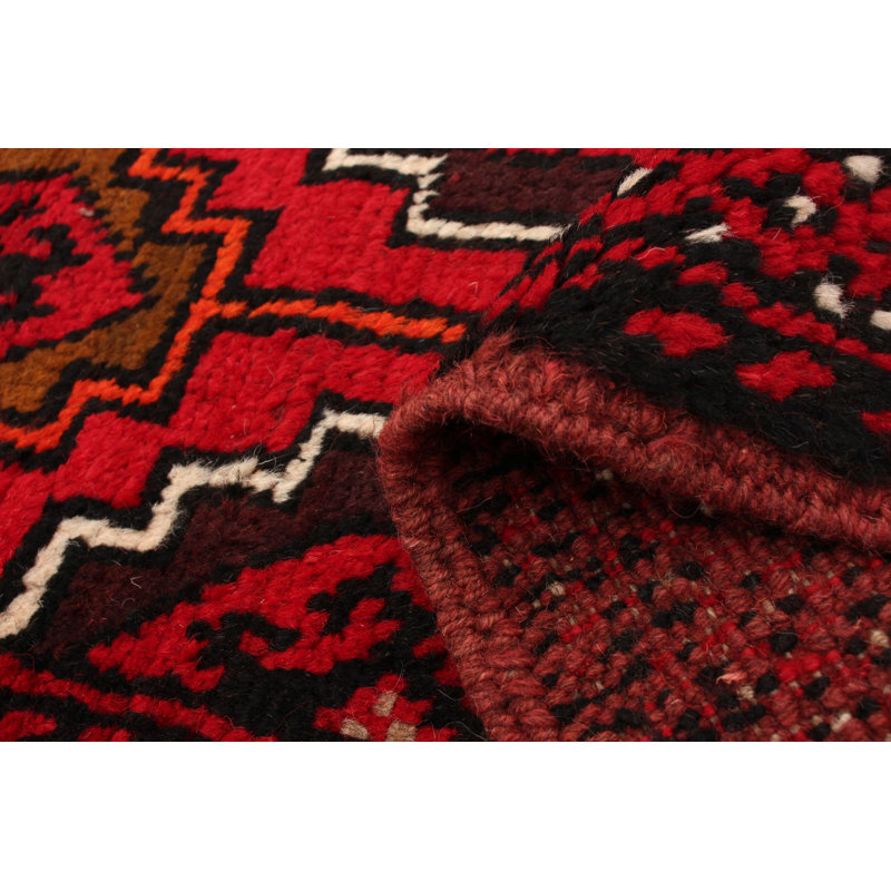 Tapis rouge / orange en laine noué à la main