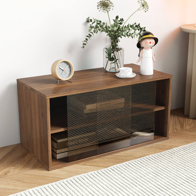 Bibliothèque de rangement empilable avec portes coulissantes en verre, idéale pour une organisation et une présentation sans encombrement