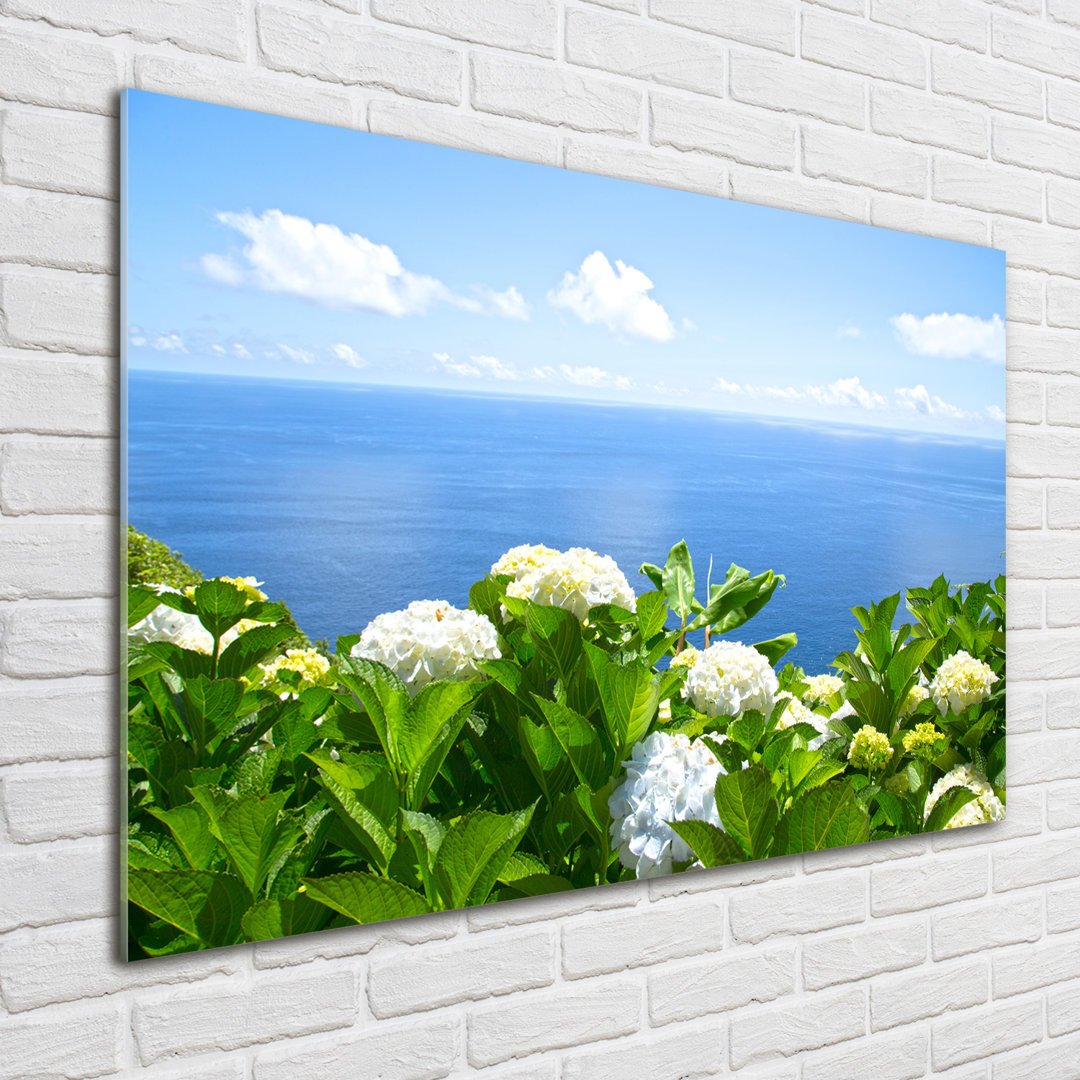 Glasbild Blumen am Meer