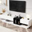 Meuble télé élégant avec espaces de rangement cachés: maximiser l'espace, armoire blanche Options polyvalentes: moderne, convient aux téléviseurs jusqu'à 80 po