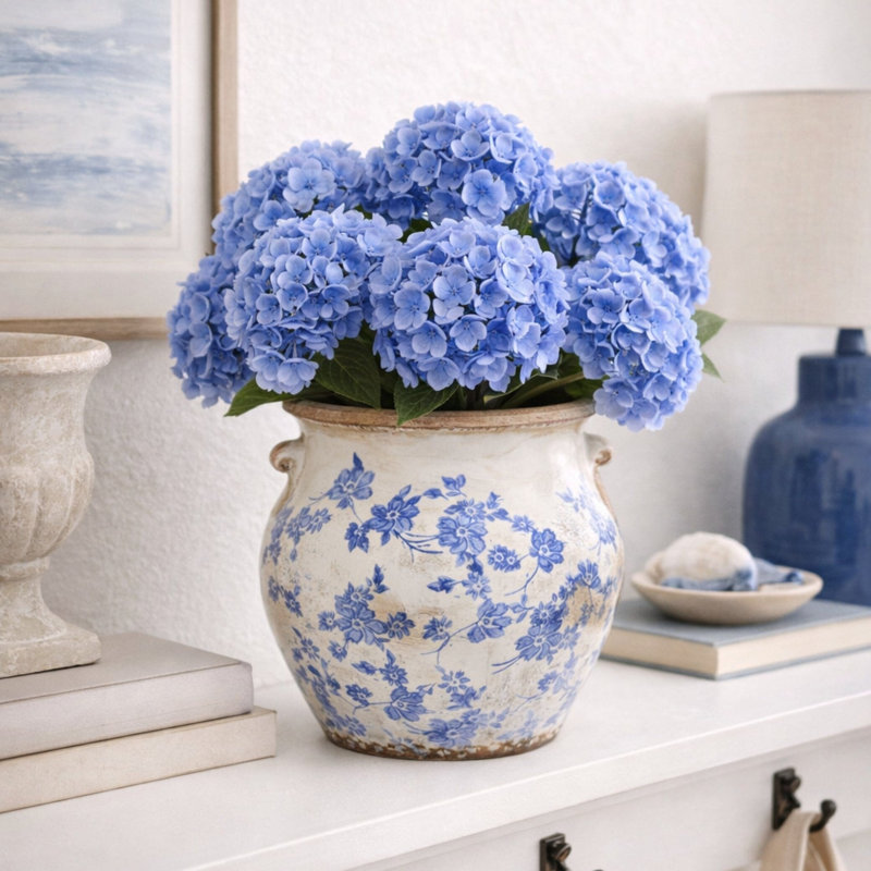 Tuscan Ceramic Blue Scroll Urn Vase, 9.75" H x 10.5" W x 10.5" D