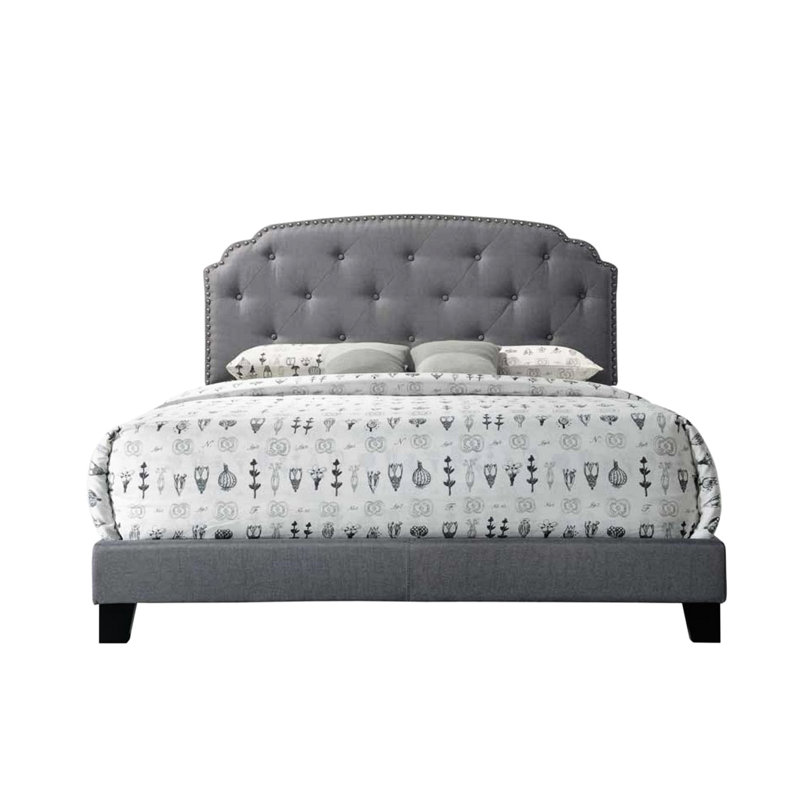 Grand lit en tissu gris avec une base élégante et discrète et une structure robuste et durable