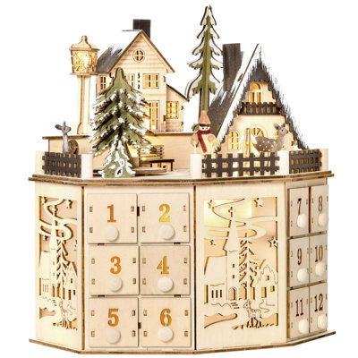 Table de Noël illuminée avec calendrier de l'Avent et tiroirs de compte à rebours