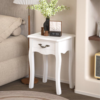 Élégante table de rangement sur pied avec tiroir et pieds courbés pour une utilisation polyvalente
