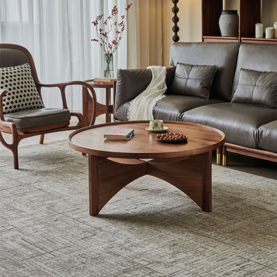 Table basse ronde en noyer noir massif