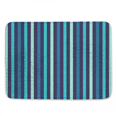 Tapis de bain bleu à rayures verticales