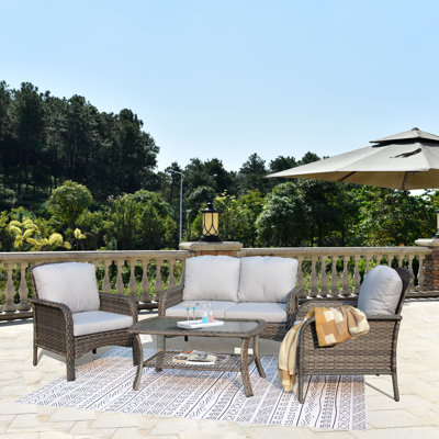 Jago Patio 4 Piece Rattan Sofa Seating Group with Cushions by Bay Isle Home
