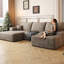 Canapé modulaire confortable en forme de U avec repose-pieds, idéal pour la détente dans le salon