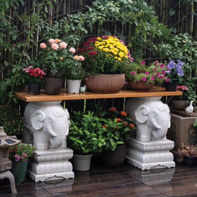 Teak outdoor storage rack elephant stone pier base by Sleek Surface Designs
