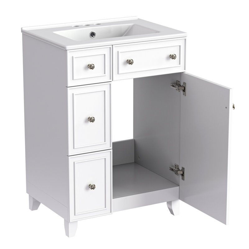 Meuble-lavabo de 24 pouces avec lavabo en céramique. Gain de place. 2 tiroirs, 1 porte. Et bois. Blanc. Facile à entretenir - il y a beaucoup d'espace de rangement. Assemblage