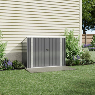 Metal garbage room with sloped roof