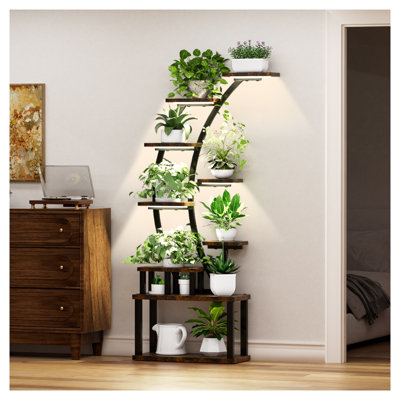 Support pour plante d'intérieur à 9 niveaux avec lumières de culture intégrées, grande tablette de jardin verticale de 63,6 po, panneau de fibres à densité moyenne brun rustique et présentoir en métal avec modes d'éclairage réglables