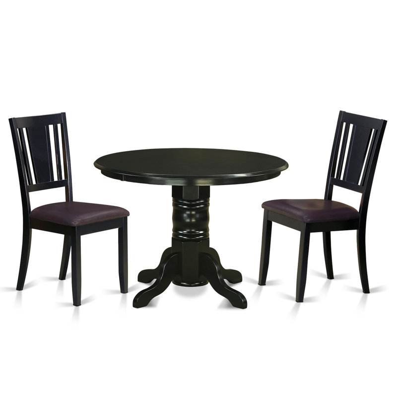 L'ensemble de salle à manger 3 pièces comprend une table de cuisine ronde avec piédestal et 2 chaises de salle à manger en similicuir de 42 po x 42 po, noir