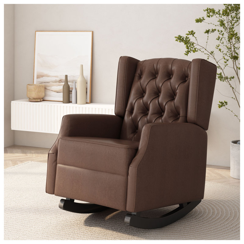 Chaise berçante contemporaine en similicuir brun foncé avec design à oreilles et capitonnage à losanges