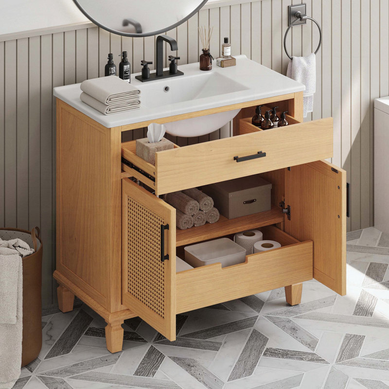 Meuble-lavabo en rotin avec lavabo en céramique et portes artisanales