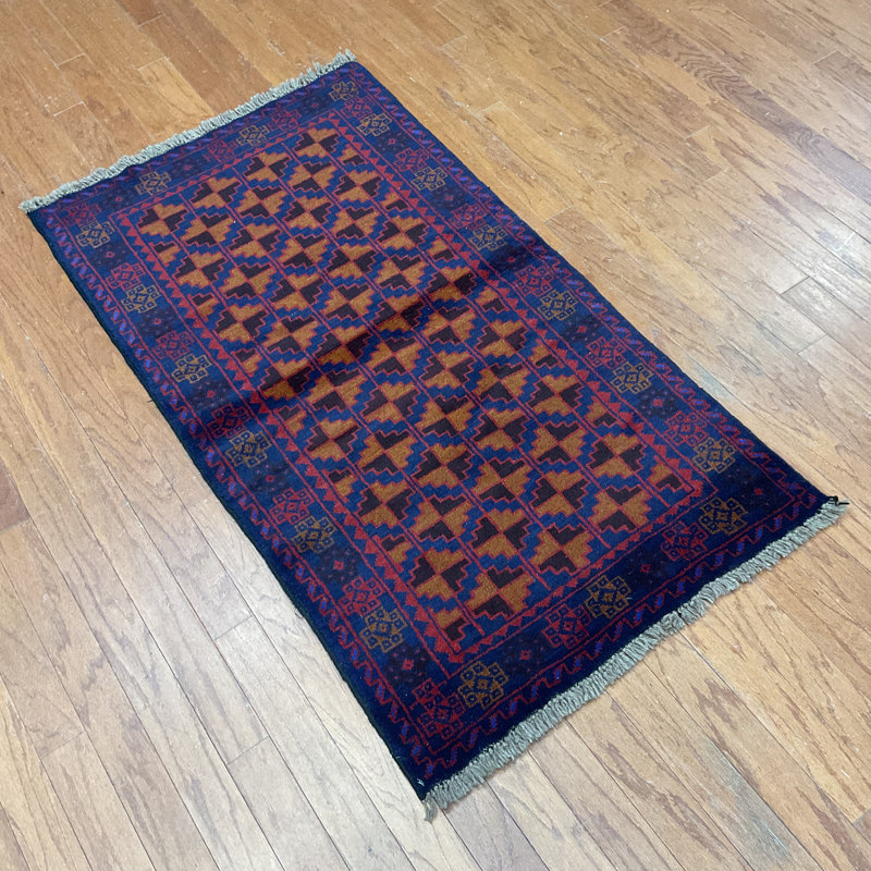 Tapis orange / bleu marine Hilario