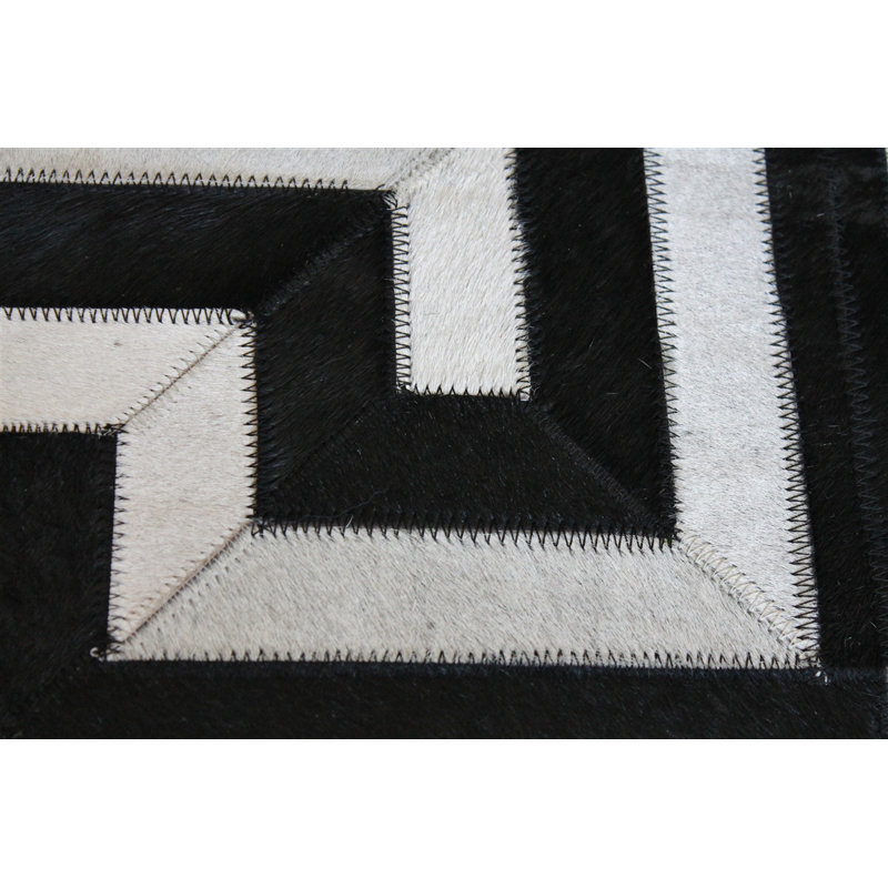 Handmade Black and White Geometric Cowhide Rug 4' x 6'