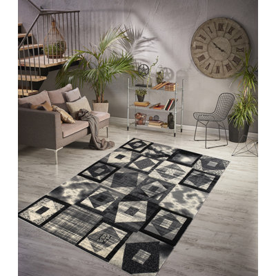 Tapis abstrait blanc / gris anthracite Tyka