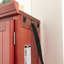 Armoire de coin en cerisier avec 8 portes et un grand espace de rangement