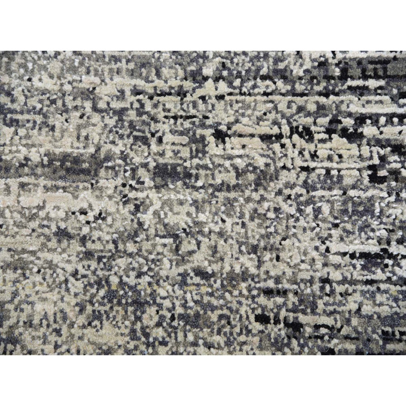 Tapis noir en laine New Age Caprisha