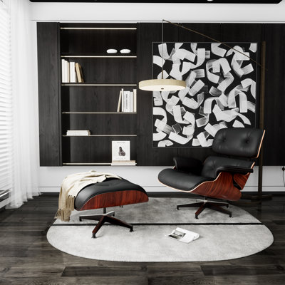 Fauteuil et repose-pieds en cuir véritable