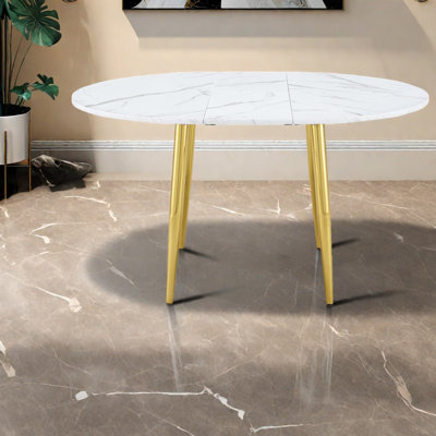 Table de salle à manger à motif MDF et pieds en métal doré