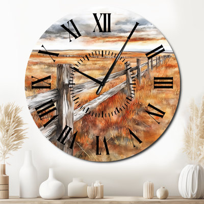 Clôture en bois le long des champs d'automne - Horloge murale en métal orange