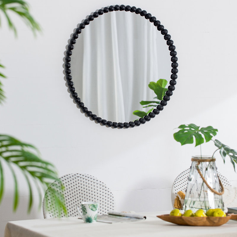 Miroir circulaire avec cadre perlé en métal