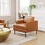  Fauteuil brun en similicuir rembourré