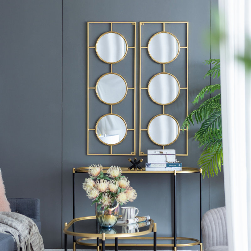 3 miroirs muraux dans un cadre rectangulaire doré