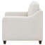 Fauteuil beige rembourré incliné