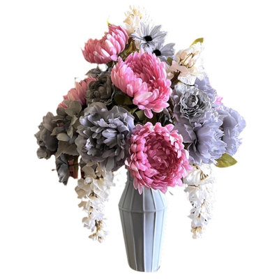 Arrangement floral mélangé dans un vase