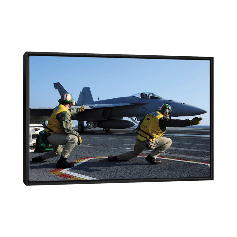 " Shooters Aboard The USS George HW Bush Give The Go-Ahead Signal To Launch An F/A-18 Super Hornet " by Stocktrek Images