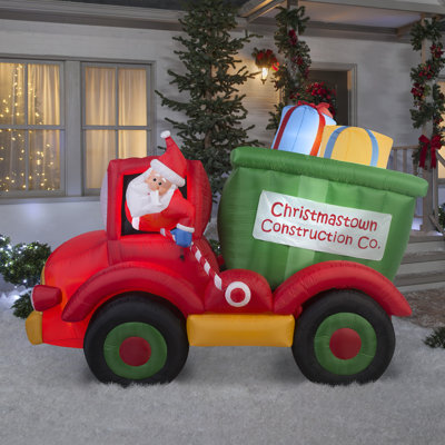 Camion à benne gonflable animé avec cadeaux