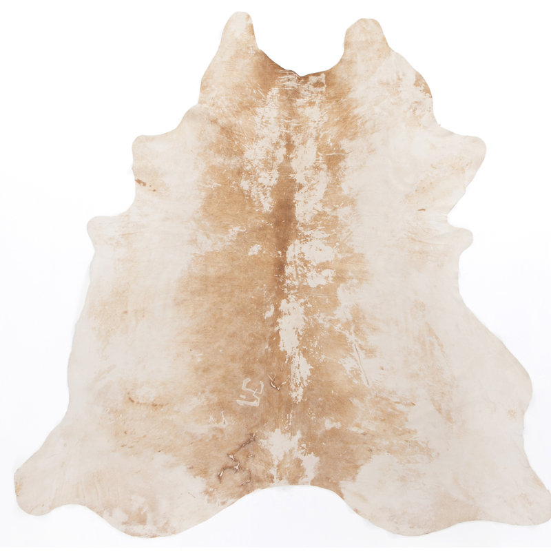 Harland Cowhide Animal Print Area Rug in Ivory
