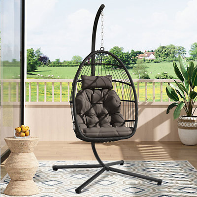 Cozy Rattan Hanging Chair: Perfect for Lazy Afternoons Indoors or Out