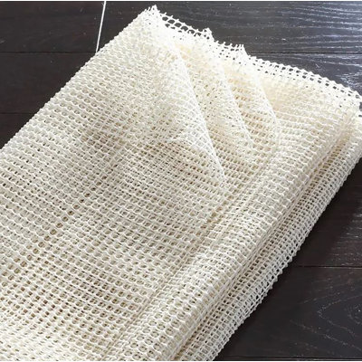 Sous-tapis beige antidérapant