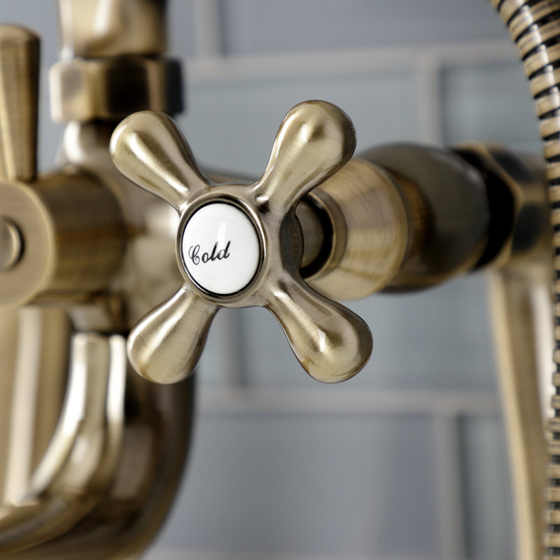 Kingston Brass Kingston Three-Handle 2-Hole Deck Mount Clawfoot Tub Faucet with Handshower, Antique Brass
