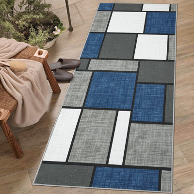 Tapis bleu foncé lavable à motif géométrique moderne