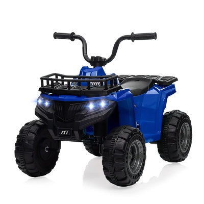 Jouet électrique pour enfant à 4 roues 12V 4 roues avec pneus à traction haute vitesse, vitesse de pointe 1,8 MPH, phares à DEL, lecteur de musique et port USB pour les enfants de 3 à 8 ans